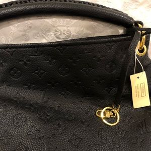 Reselling “LV” Purse